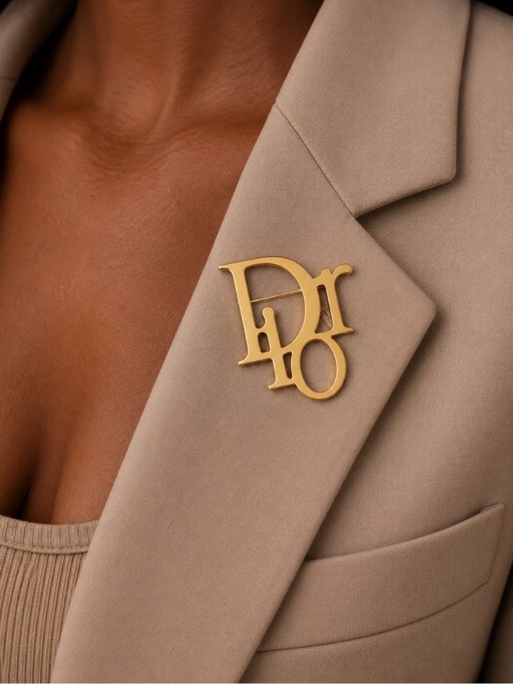 Dior Gold Monogram 'CD' Brooch on Beige Lapel